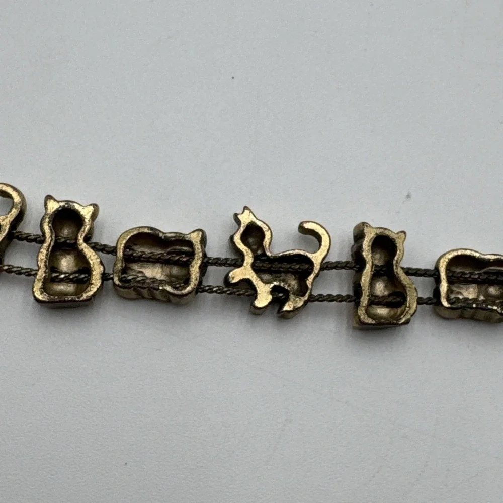 Vintage Avon Gold Tone Sliding Cat Charm Bracelet Rhinestone Red Heart Marked SP